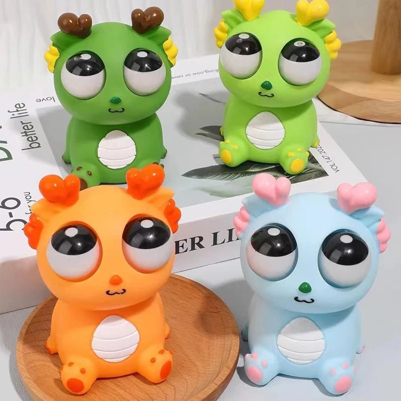 Juguete de descompresión de dinosaurio dragón de ojo explosivo creativo, juguete sensorial de animales de liberación divertida para exprimir alegría