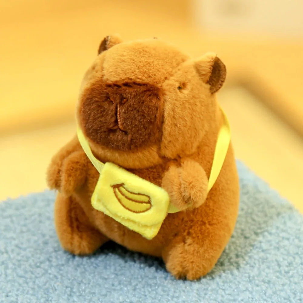 Lindo juguete de peluche de capibara de tamaño pequeño con alas Sudadera con capucha simulación muñeco de capibara juguete esponjoso regalos de cumpleaños