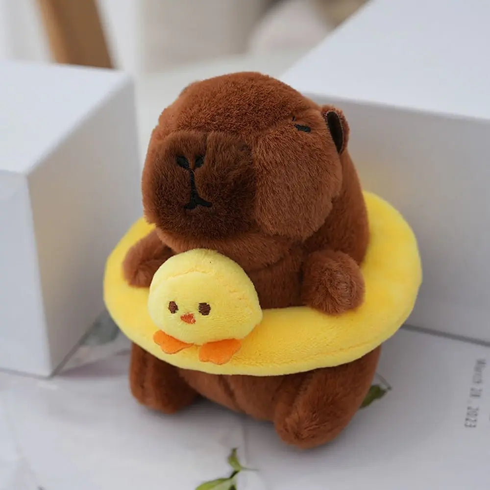 Lindo juguete de peluche de capibara de tamaño pequeño con alas Sudadera con capucha simulación muñeco de capibara juguete esponjoso regalos de cumpleaños