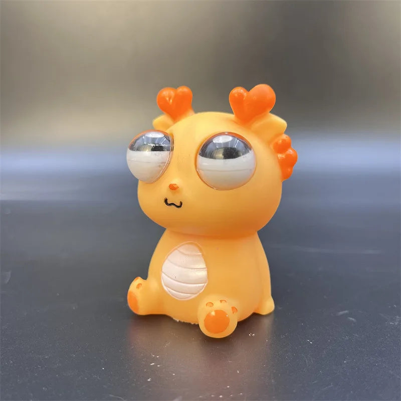 Juguete de descompresión de dinosaurio dragón de ojo explosivo creativo, juguete sensorial de animales de liberación divertida para exprimir alegría