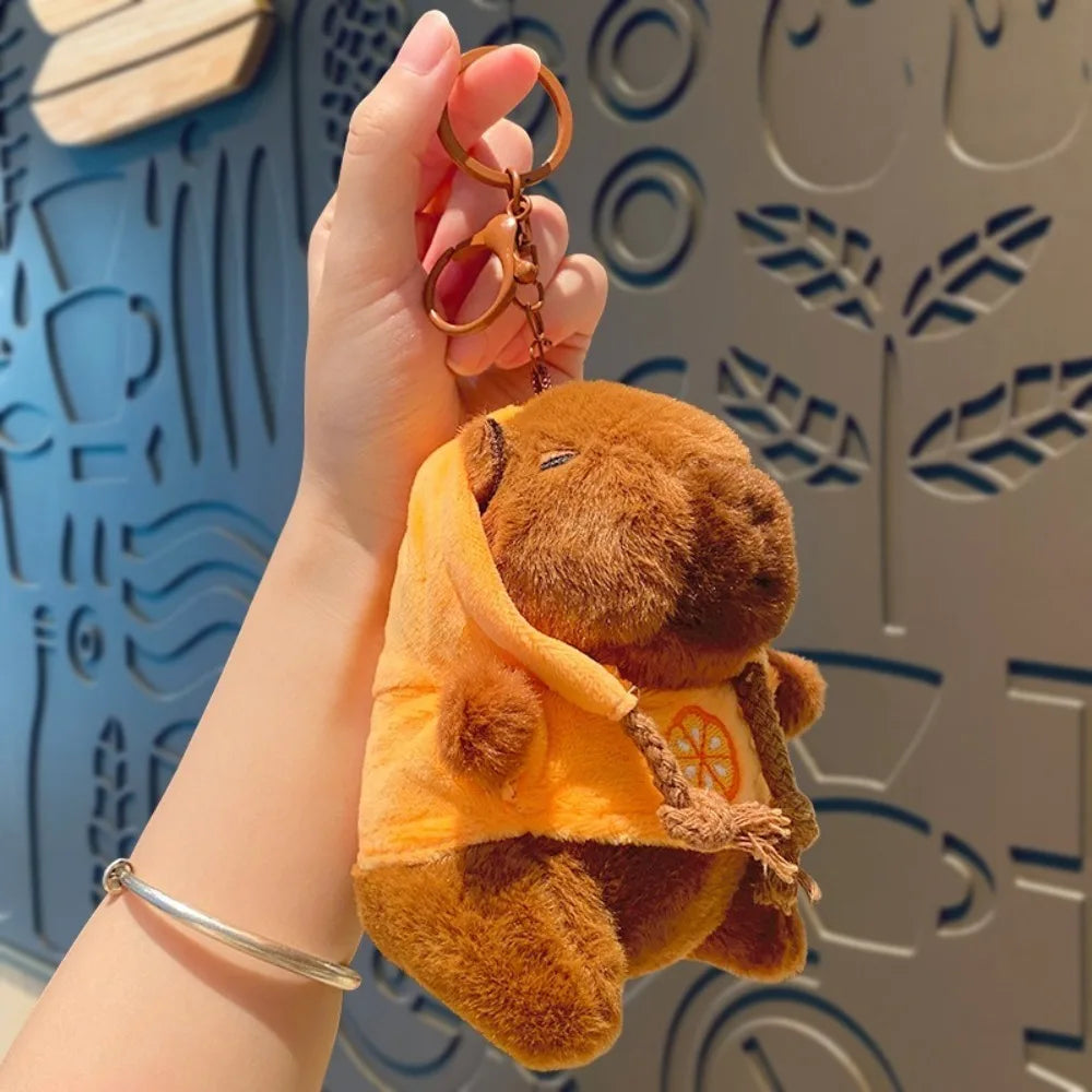 Lindo juguete de peluche de capibara de tamaño pequeño con alas Sudadera con capucha simulación muñeco de capibara juguete esponjoso regalos de cumpleaños