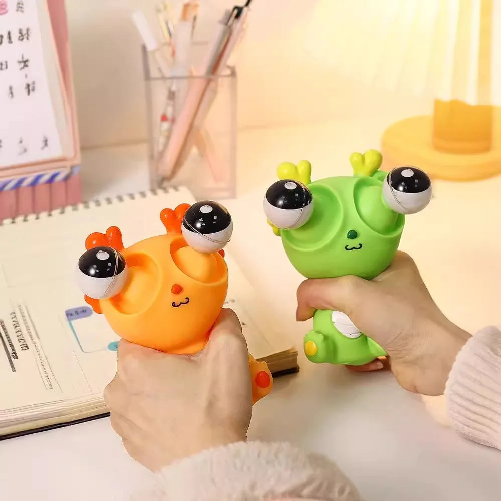 Juguete de descompresión de dinosaurio dragón de ojo explosivo creativo, juguete sensorial de animales de liberación divertida para exprimir alegría
