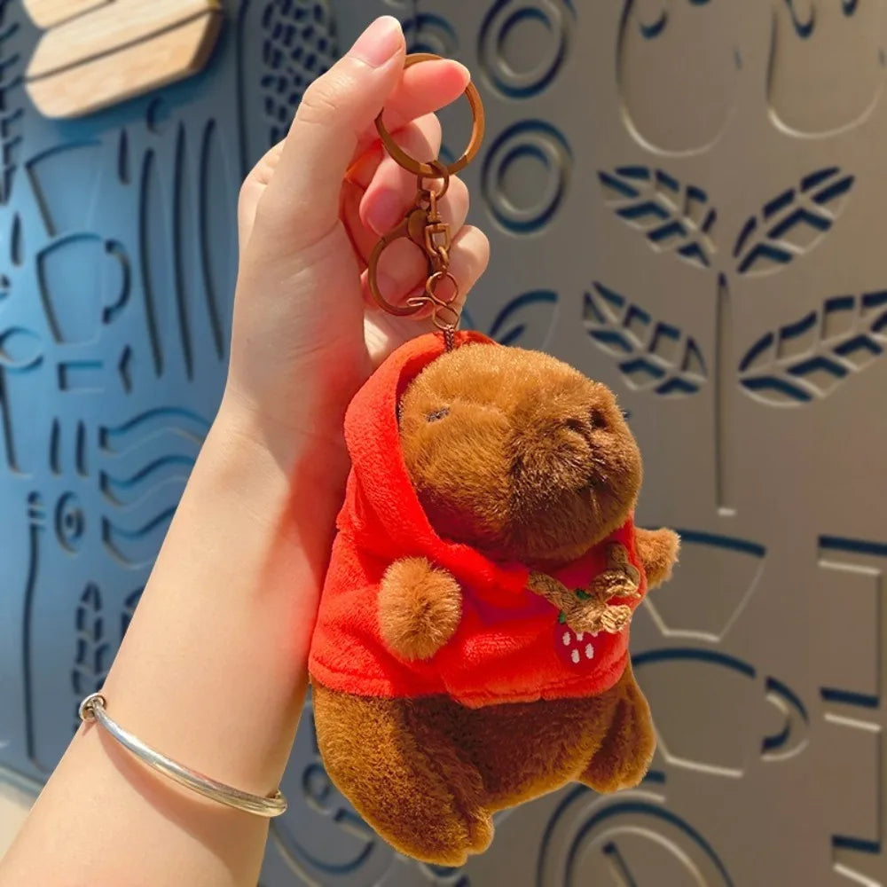 Lindo juguete de peluche de capibara de tamaño pequeño con alas Sudadera con capucha simulación muñeco de capibara juguete esponjoso regalos de cumpleaños