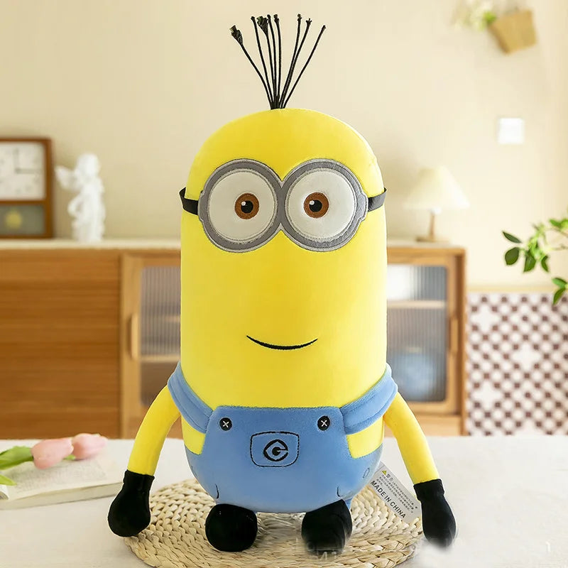 Minions película periferia amarillo peluche Bob Stuart juguetes de peluche en Jeans muñecas suaves almohada decoración niños regalo de cumpleaños