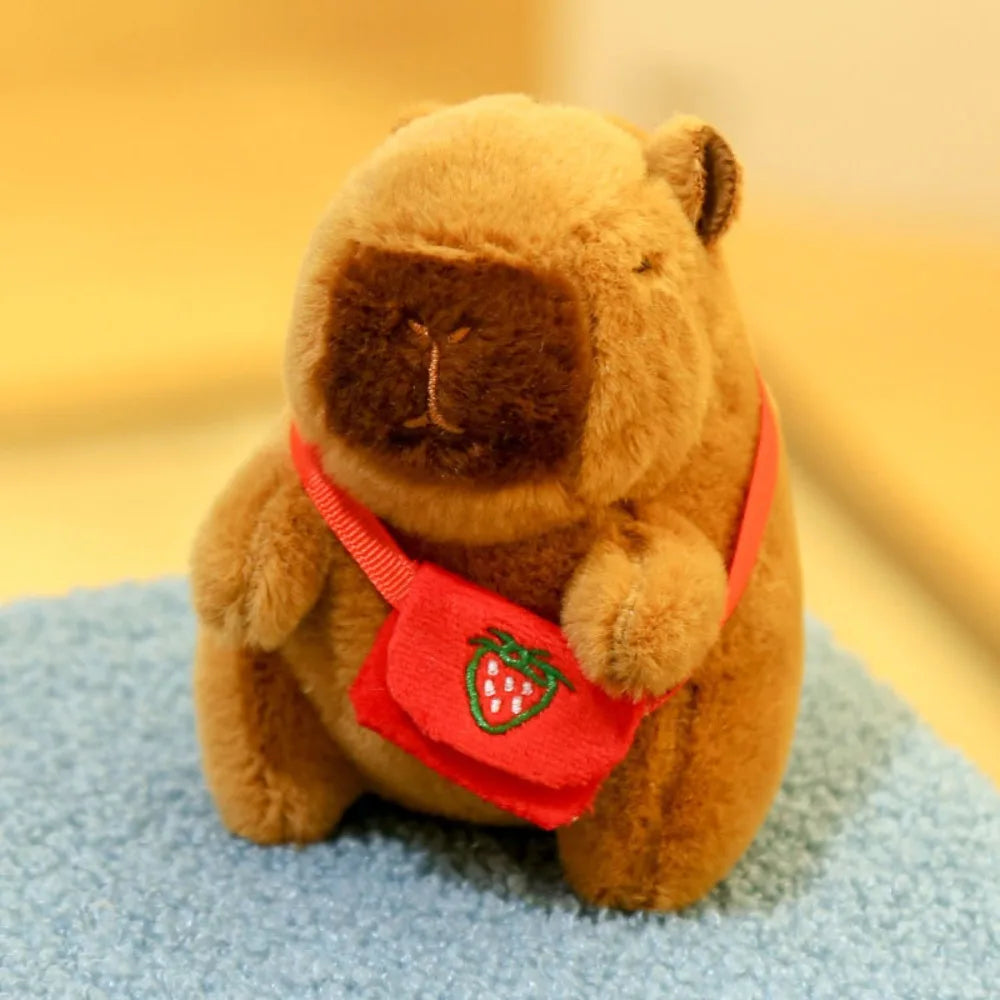Lindo juguete de peluche de capibara de tamaño pequeño con alas Sudadera con capucha simulación muñeco de capibara juguete esponjoso regalos de cumpleaños